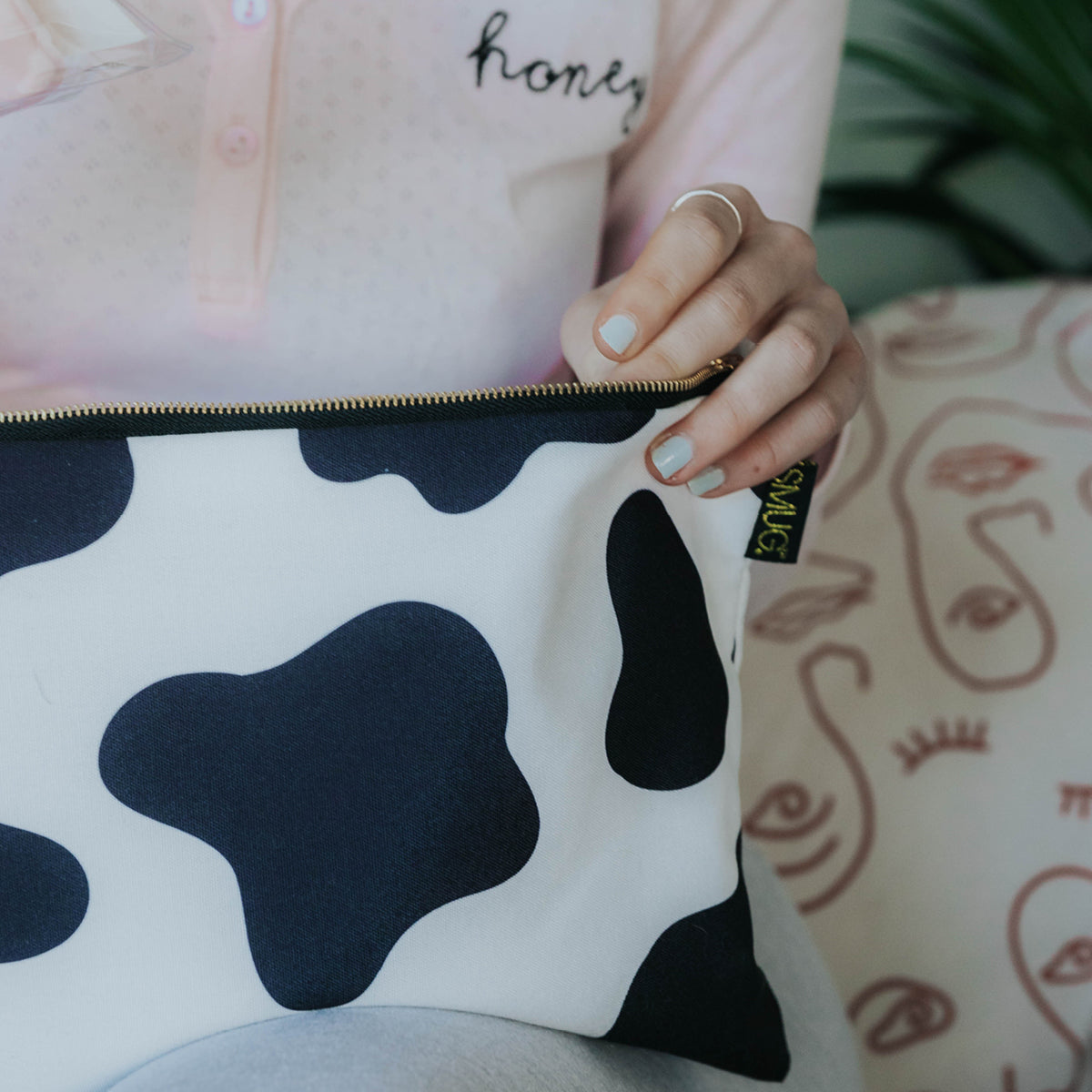 Cow print outlet clutch