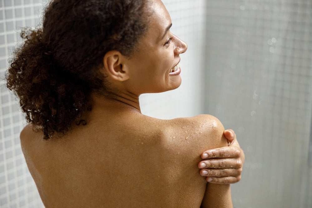 Woman having an energising shower