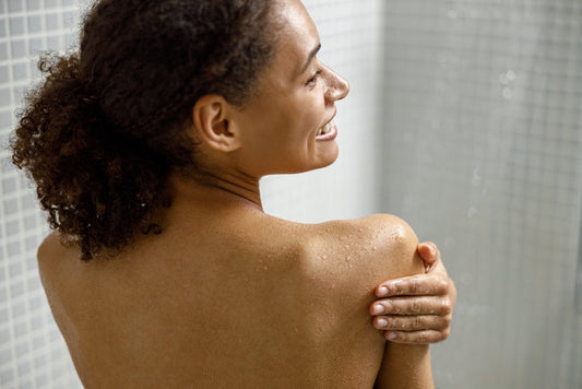 Woman having an energising shower