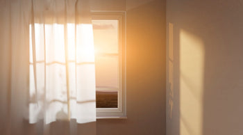Morning sunshine lighting up a bedroom