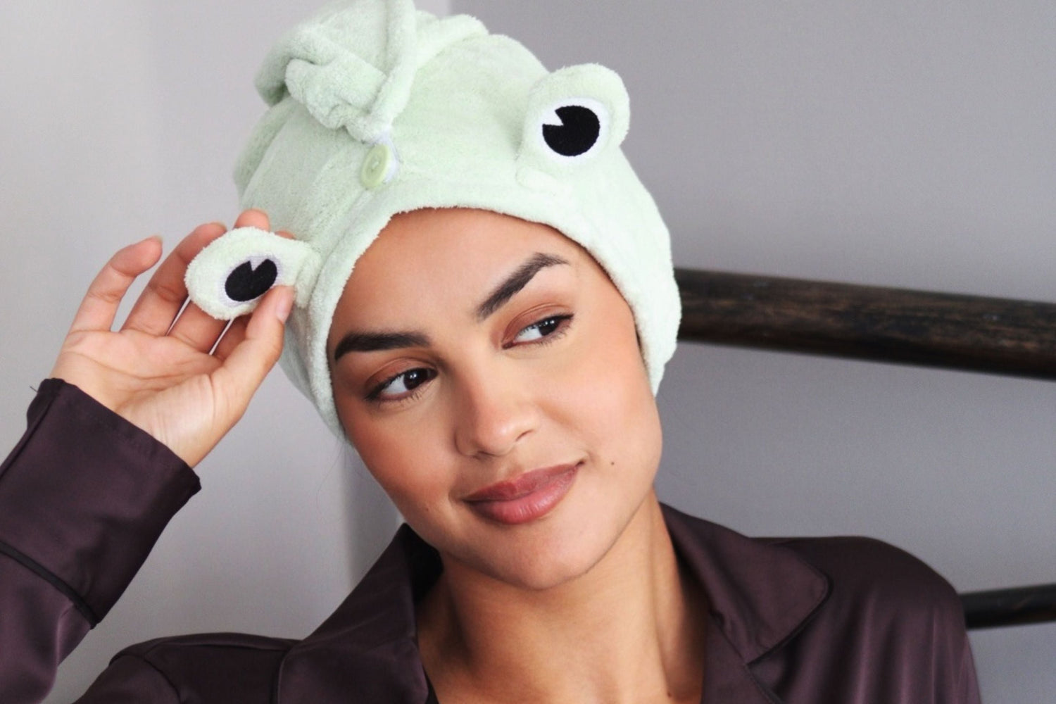 Woman smiling wearing Smug 'Frog' Novelty Hair Towel Wrap