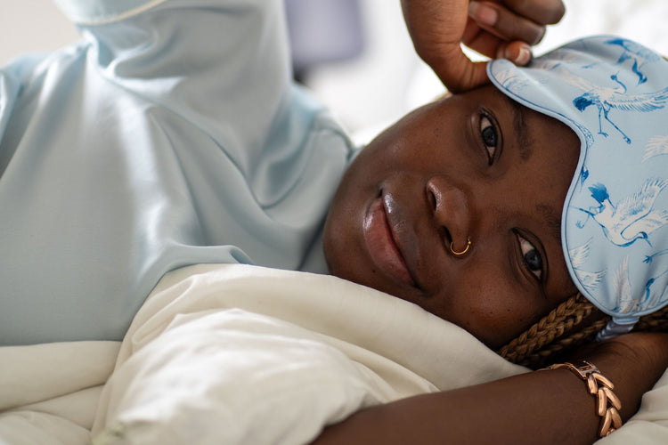 woman wearing cranes satin sleep mask - the perfect gift for her